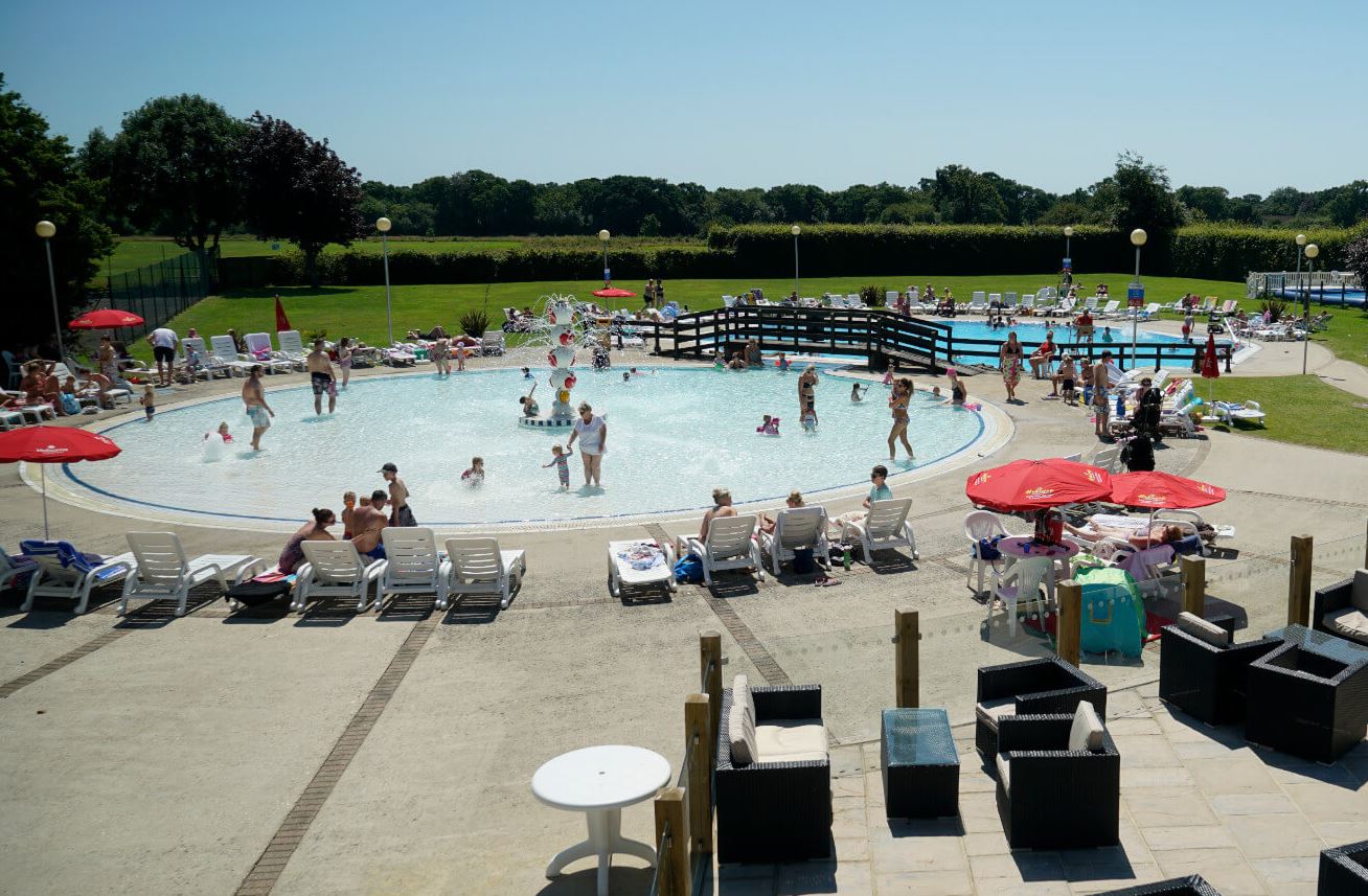 Bashley Park outdoor swimming pool area for dog friendly caravans  in the new forest