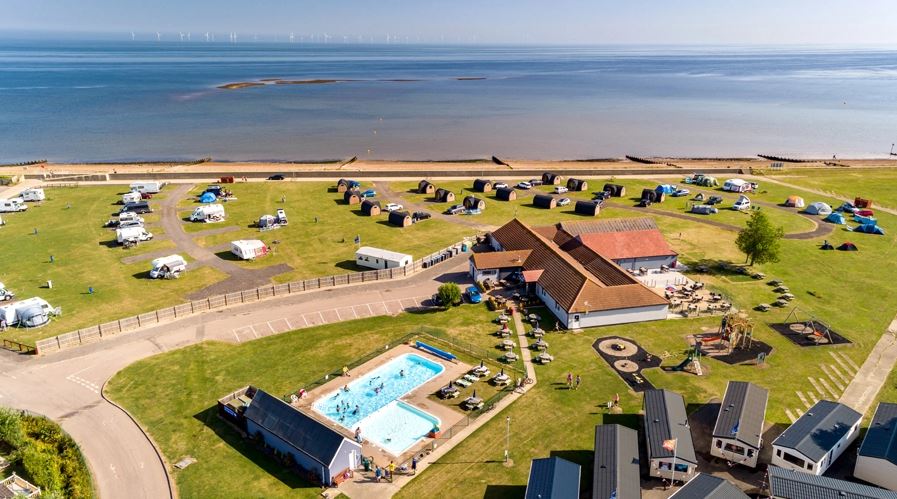 Ariel view of a holiday park and the sea