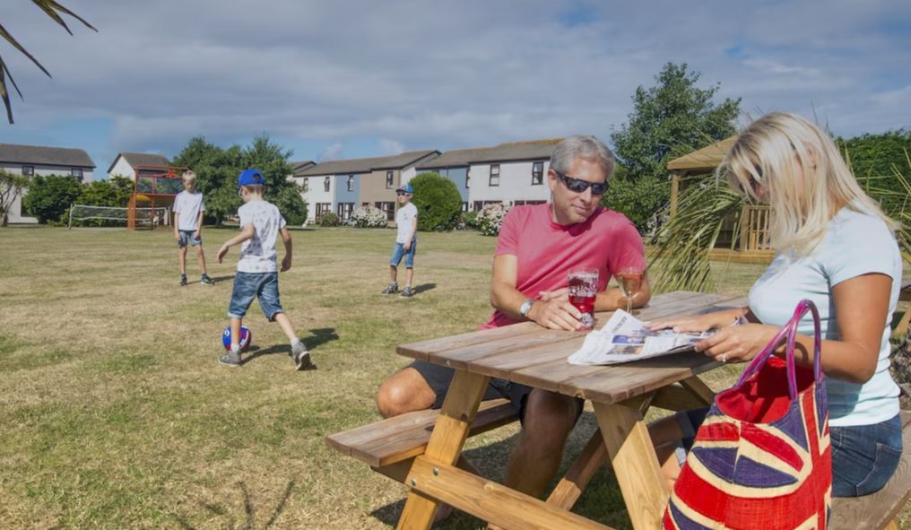 A Family Playing and Relaxing on Perran View Holiday Park