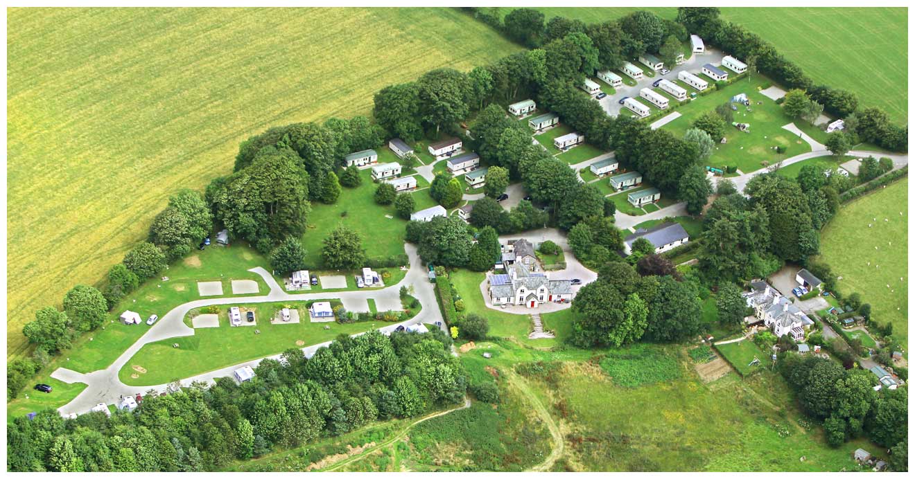 An Arial View of Woodovis Holiday Park Surrounded by Trees