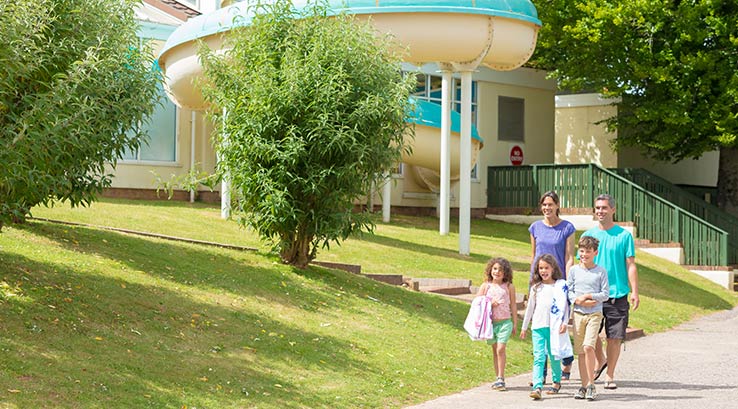 A Family Walking Through Torquay Holiday Park