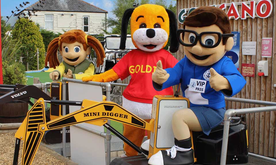 Holiday Park Mascots sat on Childrens Play Area