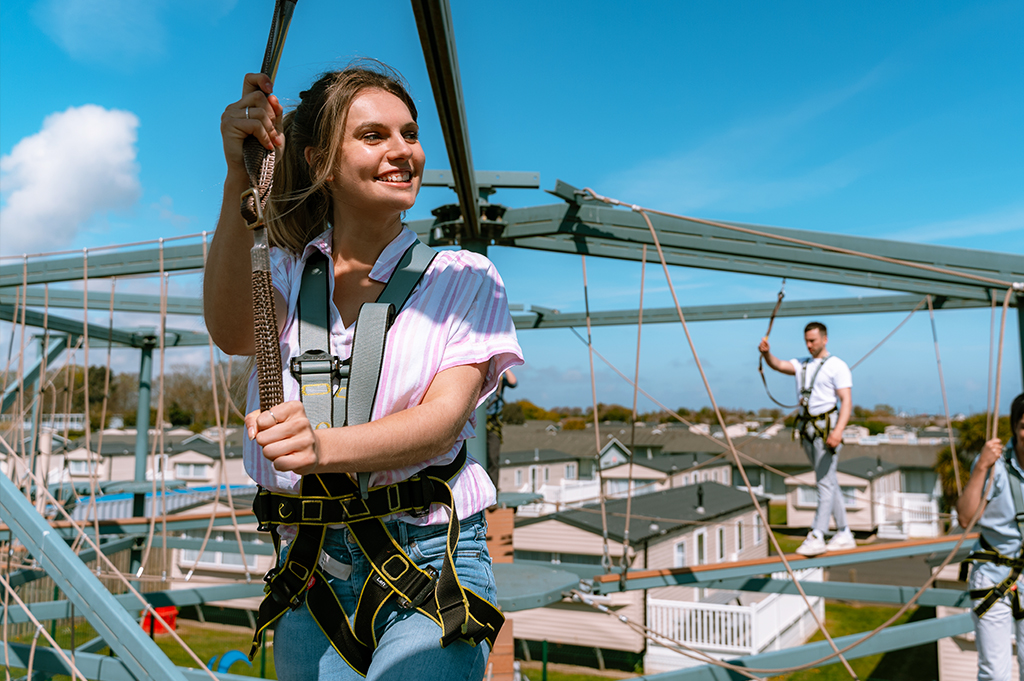 People Enjoying a High Rope Course on a Holiday Park near Great Yarmouth