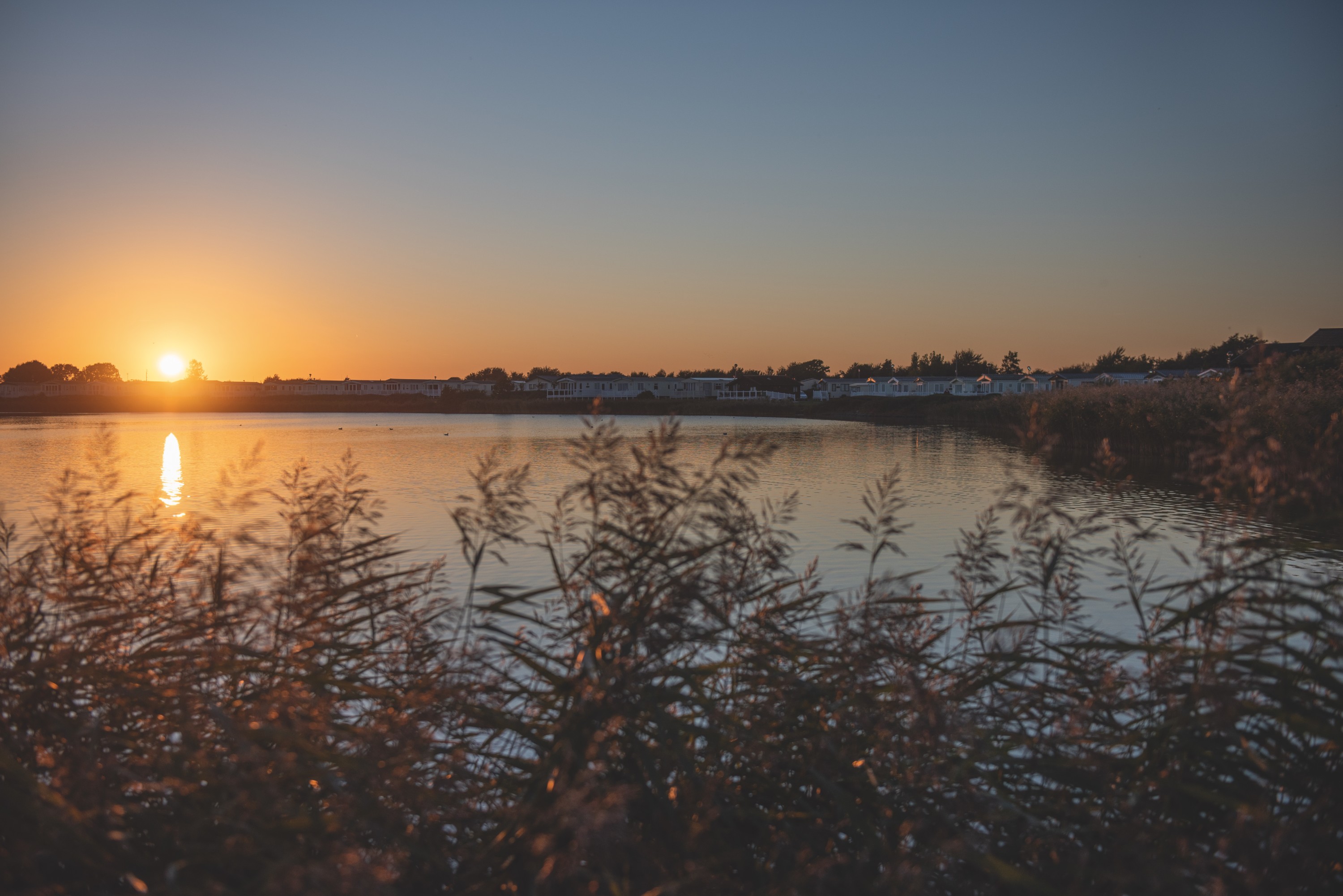 A Sunset over a Stretch of Water