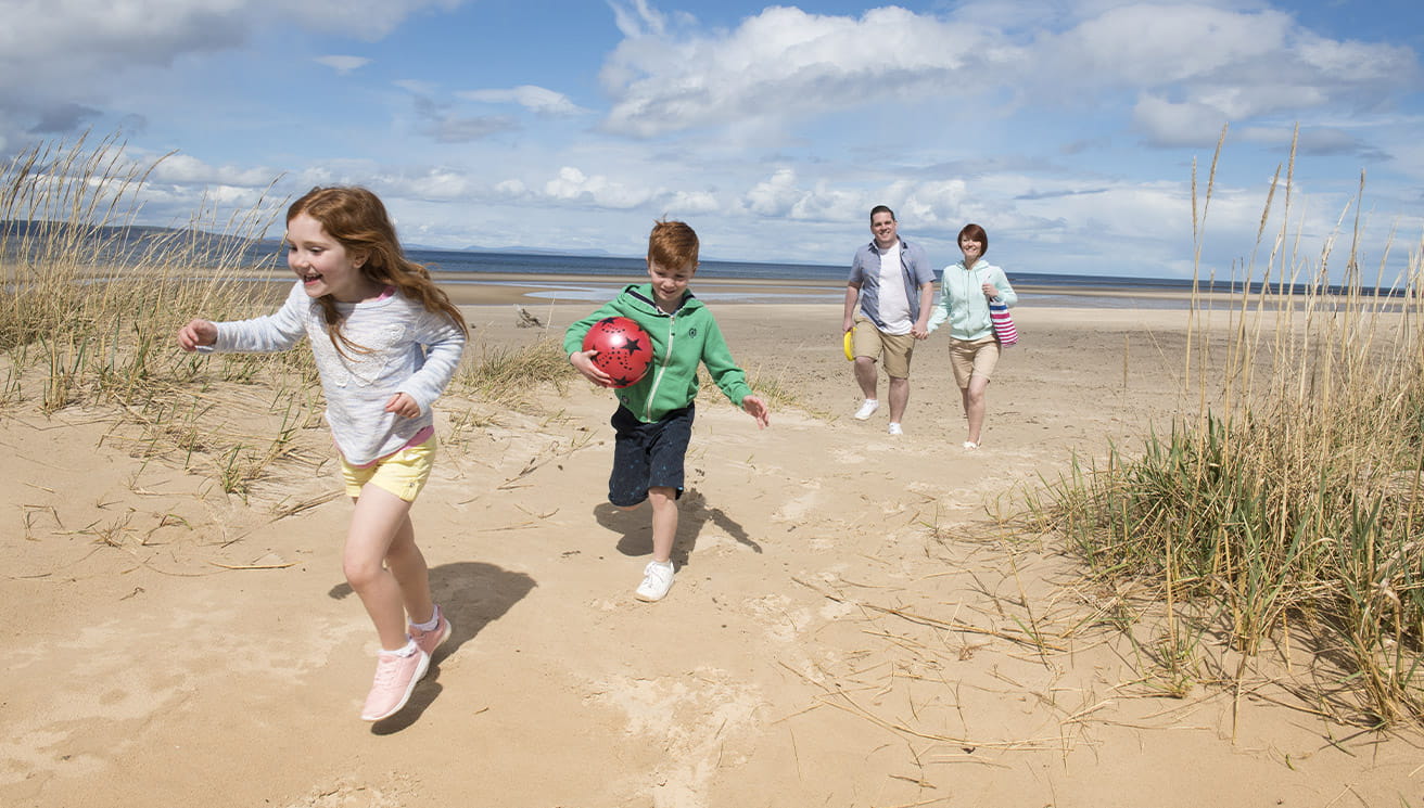 A Family on a Beach in Scotland