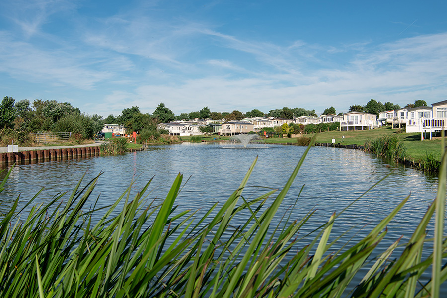 Caravan Holiday Homes Surrounding a Fishing Lake