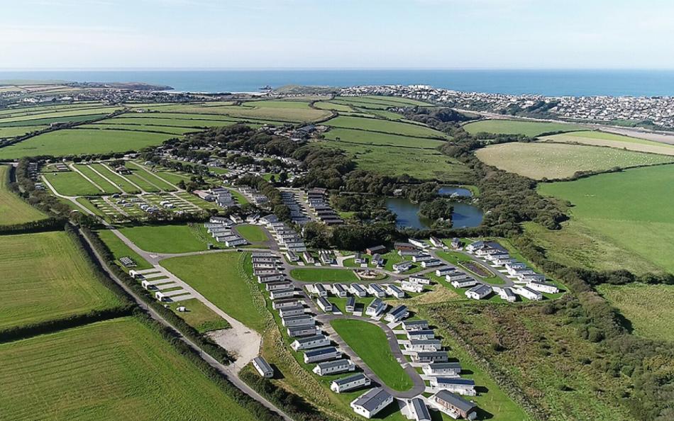 Birds eye view of Tevella Holiday Park with the sea in the background