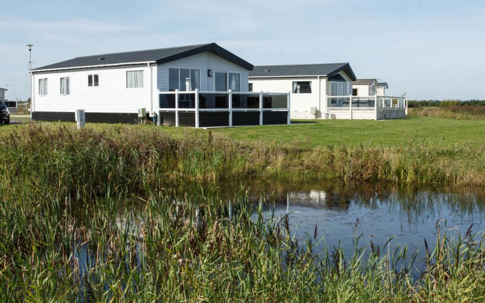 A view of holiday homes and lakeat Grange Leisure Park for Lincolnshire caravan holidays