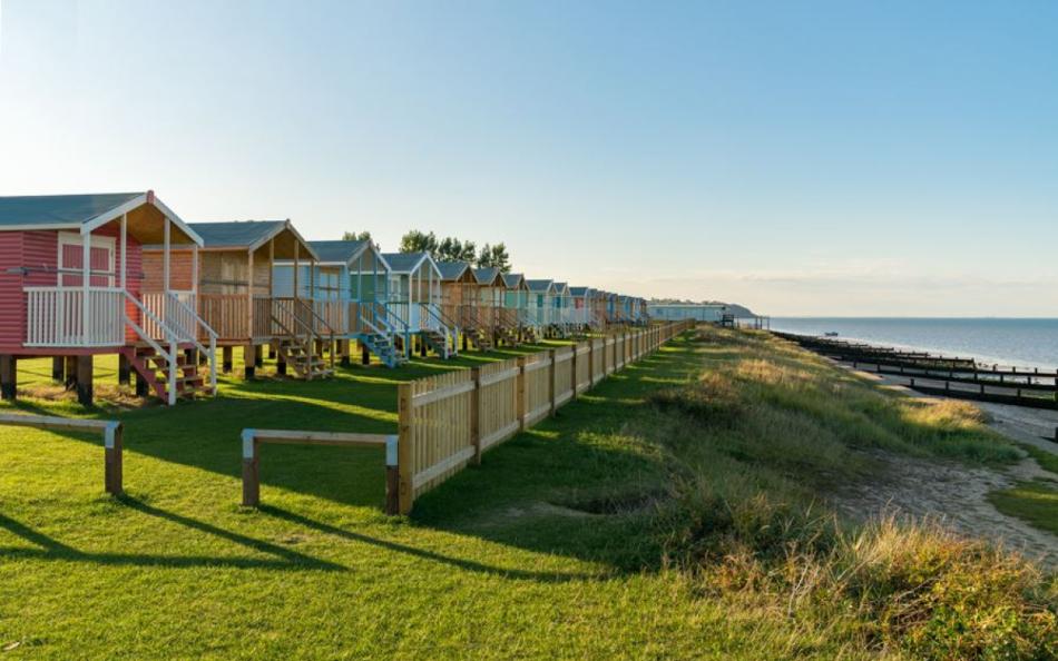 Holiday huts on the Kent  coastline looking out to sea