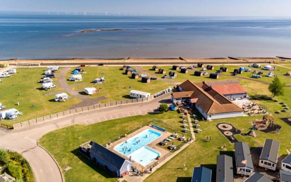 Ariel view of a holiday park and the sea