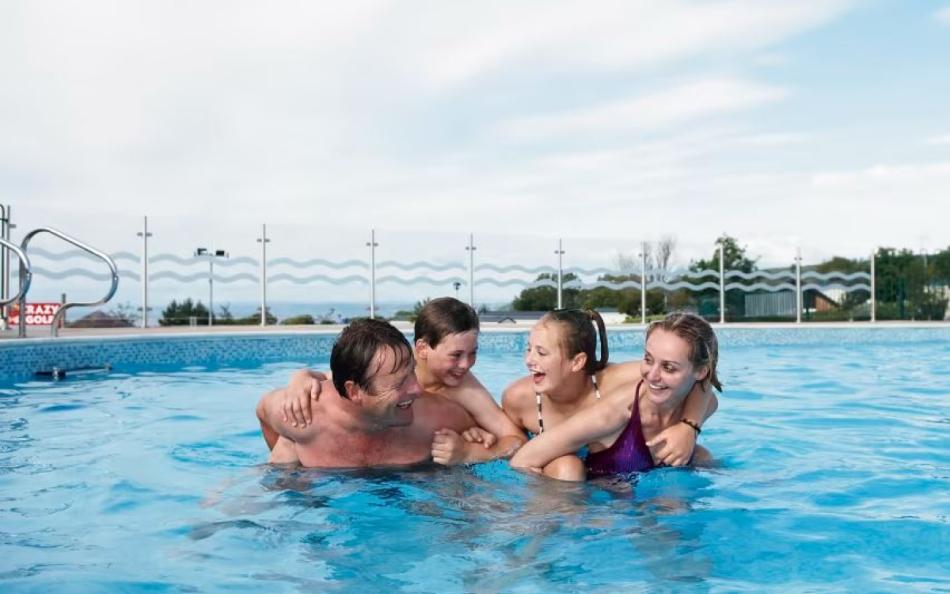 outdoor pool at Quay West for beach holidays in Wales