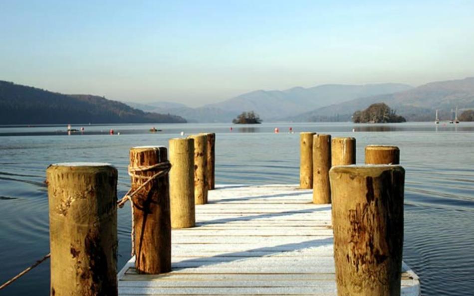 Snow covered lakeside decking at caravan parks in the Lake District