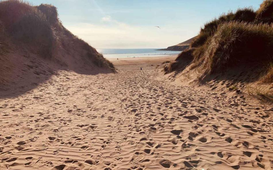 View of the North Devon Coastline Through the Sand Dunes, ideal for Walking Holidays in Devon