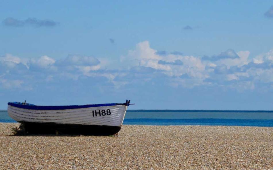 An Image of an Old Fishing Boat on a Suffolk Coastline