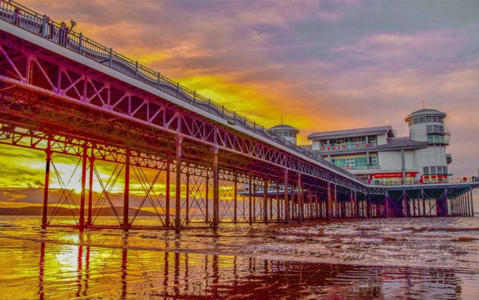 The Pier at Weston Supermare at Sunset with Refection on the Sand