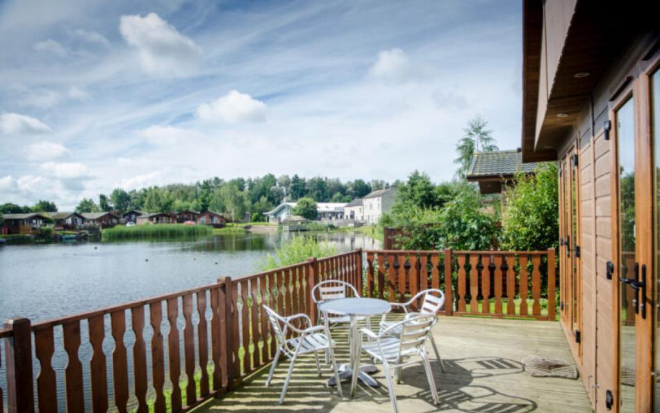 A Picture of a Fishing Lake Surrounded by Holiday Homes