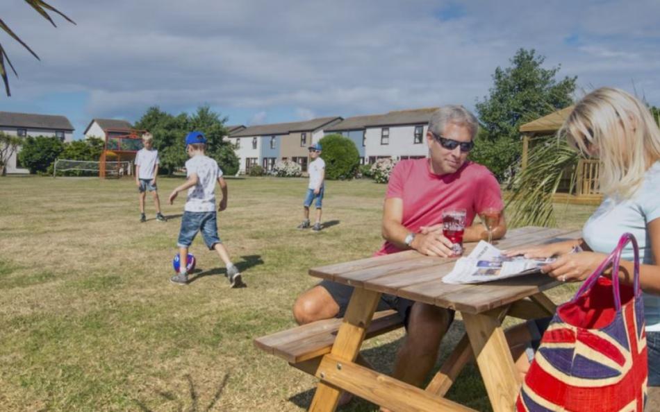 A Family Playing and Relaxing on Perran View Holiday Park