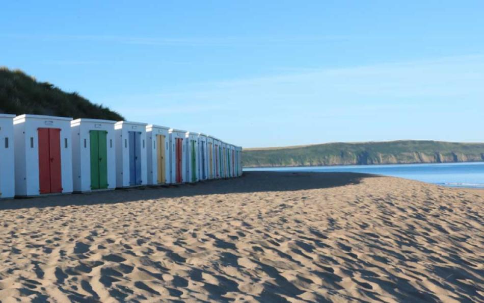 A Row of Beach Huts on the Beautiful Woolacombe Beach in North Devon