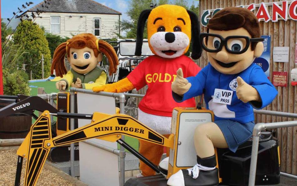 Holiday Park Mascots sat on Childrens Play Area