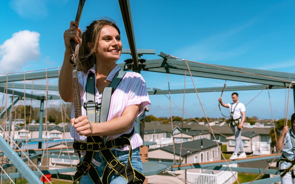 People Enjoying a High Rope Course on a Holiday Park near Great Yarmouth