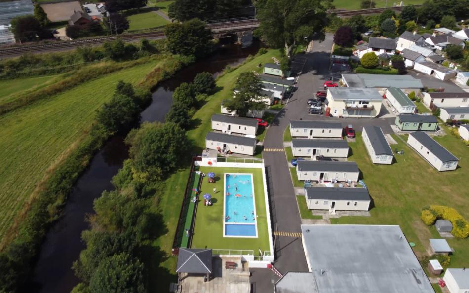 A Holiday Park near Blackpool next to a River with a Outdoor Heated Pool