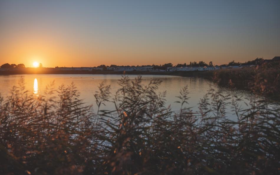 A Sunset over a Stretch of Water