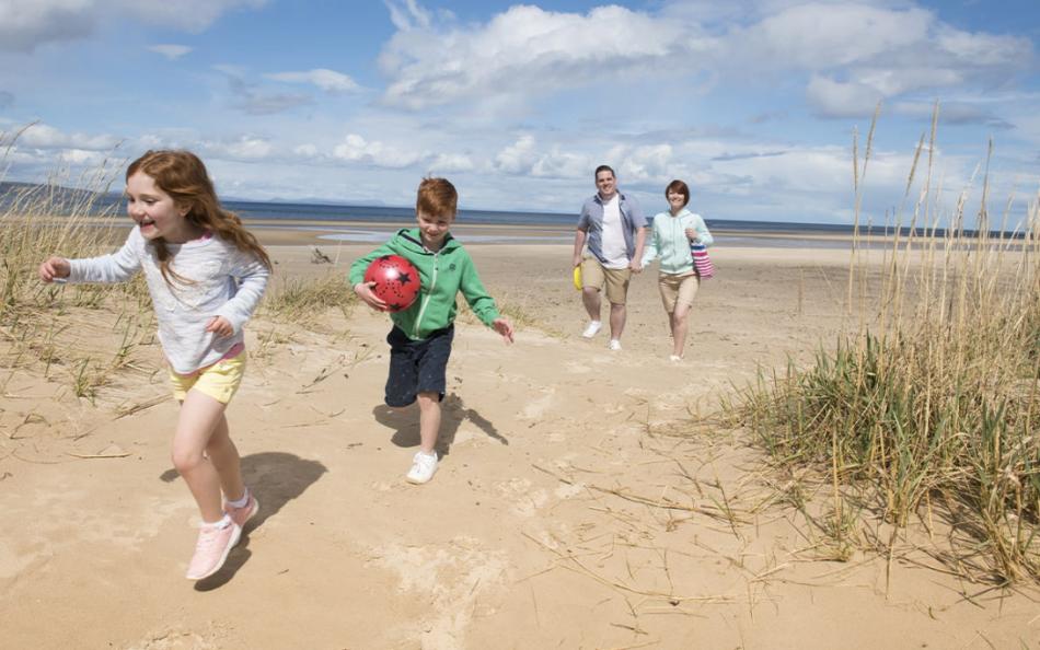 A Family on a Beach in Scotland