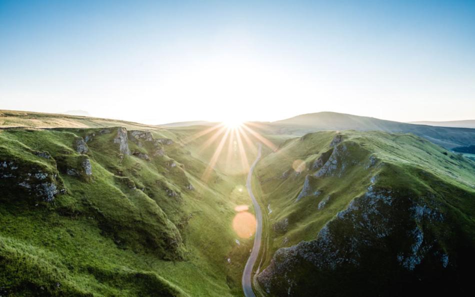 Road Weaving Through Rolling Hills in the Peak District