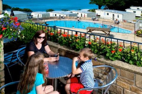 Sandaway Beach Holiday Park outdoor pool with sea views