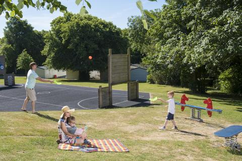 outdoor play area with seating at St Minver Holiday Park