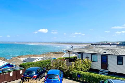 caravans overlooking the sea in Devon at Beachside Holiday Park