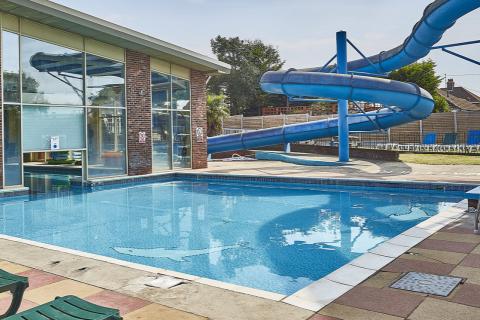 Highfield Grange Holiday Park outdoor swimming pool with flume