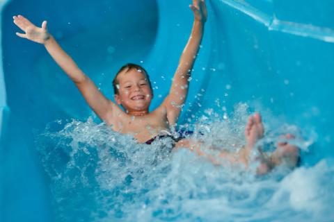 going down the flumes on holiday at Carmarthen Bay Holiday Park