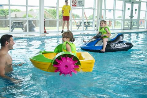 enjoying the inflatables at Withernsea Sands Holiday Park in Yorkshire