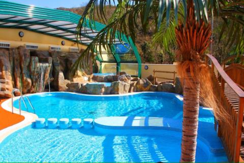 the outdoor and indoor pools at Cardigan Bay Holiday Park