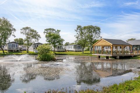 lake district caravan site with caravans by the lake