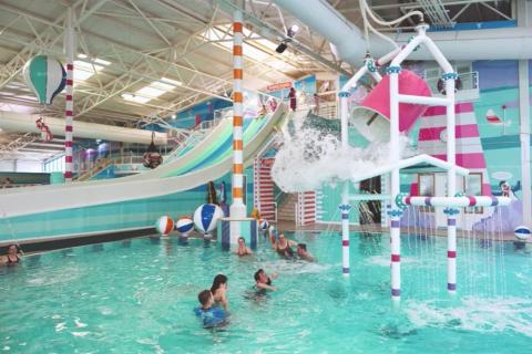 the full swmming pool with waterslides in Wales at Hafan-Y-Mor Holiday Park