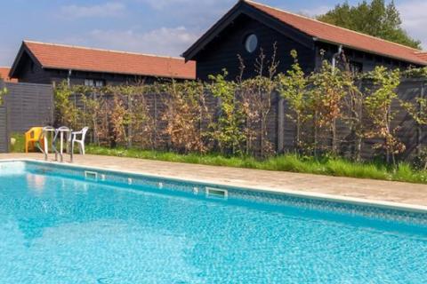 the outdoor swimming pool at The Lakes Rookley Holiday Park