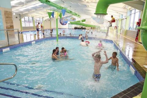 having fun under the water shoots in the pool at Golden Sands Holiday Park Lincolnshire