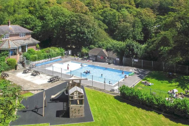 outdoor pool at views from a lodge at osmington mills lodge park