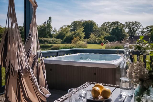 private hot tub holiday at fairway lakes lodges near fritton 