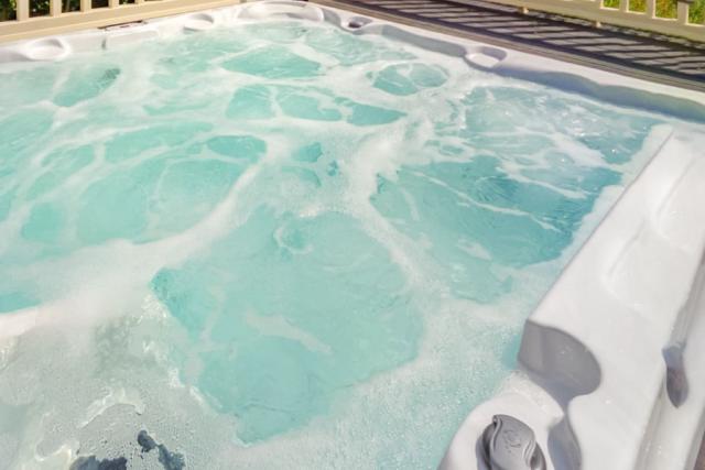 private hot tub in lodge at otters mead boutique lodges in norfolk