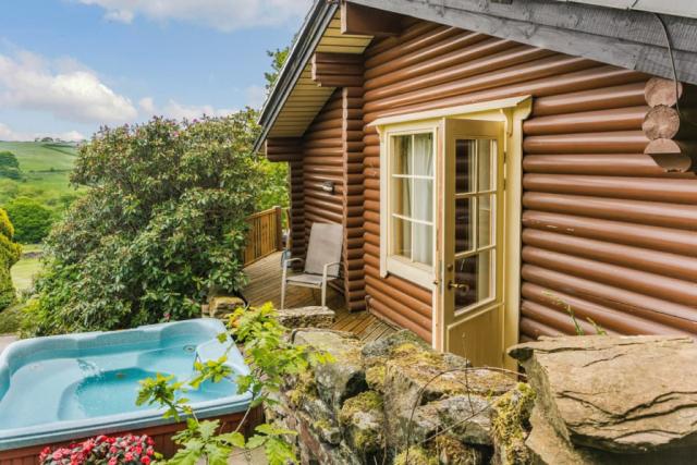 lodge with hot tub at faweather grange lodges in bingley