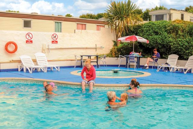 outdoor swimming pool at fishguard holiday park in pembrokeshire