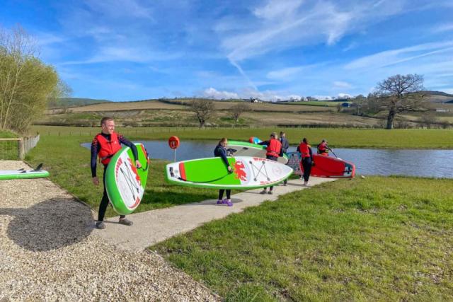 paddle boarding at meadow springs country and leisure park in caersws