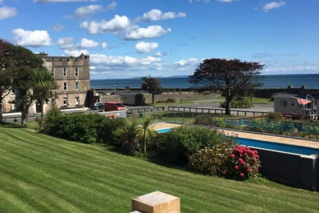 outdoor swimming pool at amroth castle holiday park near tenby