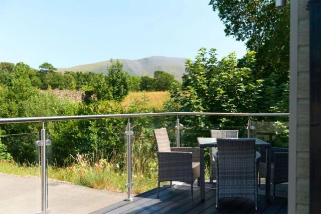 lodges overlooking the lake district countryside at Herdwick Croft Holiday Park