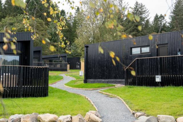contemporary lodges in the daytime at Barnsoul Holiday Resort