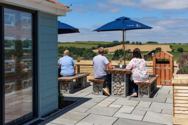 enjoying the views over Cornwall on holiday at Penmarlam Lodge Retreat