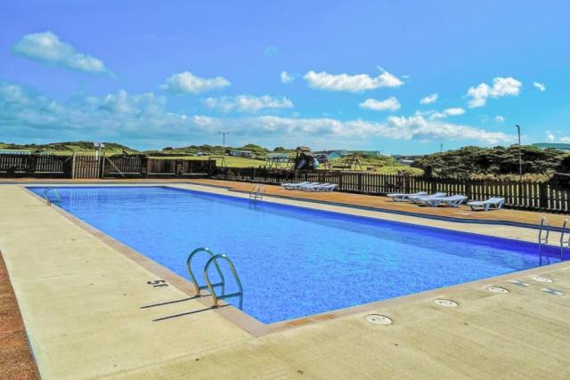 outdoor swimming pool at burrowhead holiday village near the isle of whithorn 